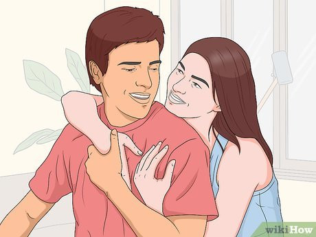 Step 2 Run your fingers along his arm, back or shoulders.